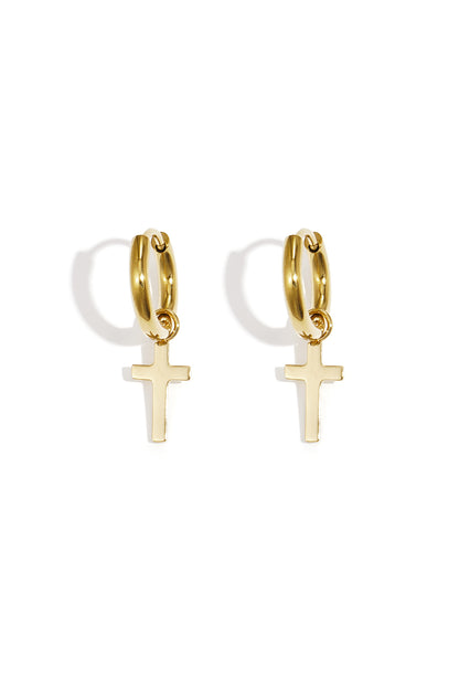 Pair of gold hoop earrings featuring delicate dangling cross pendants on a white background