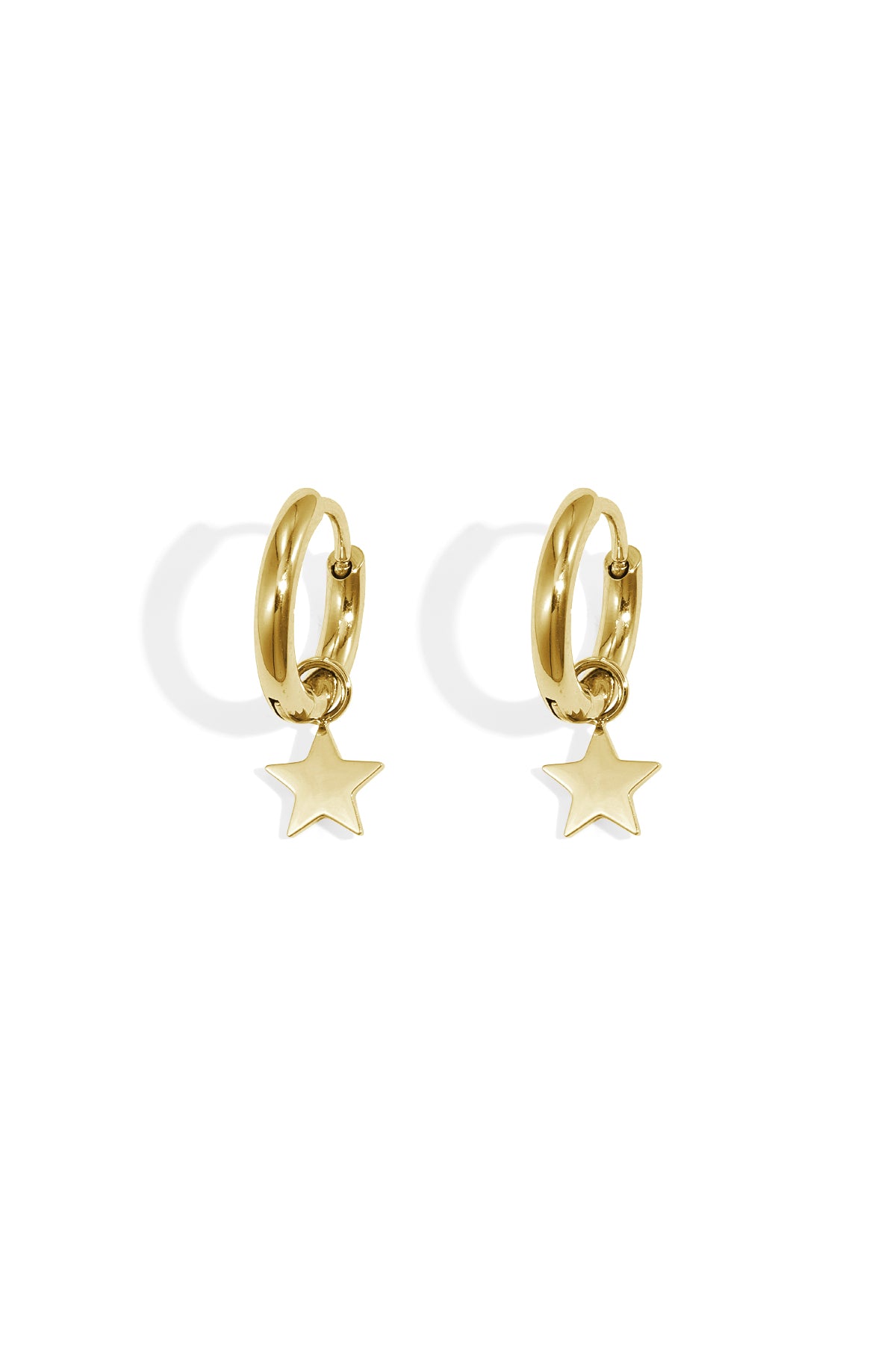 Pair of gold hoop earrings with dangling star charms on white background