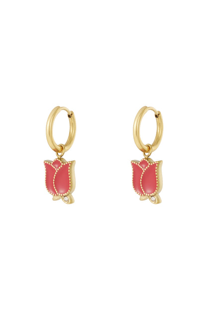Pair of gold hoop drop earrings with red enamel tulip flower charms and rhinestone accents on white background