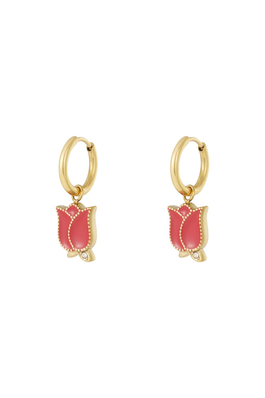 Pair of gold hoop drop earrings with red enamel tulip flower charms and rhinestone accents on white background