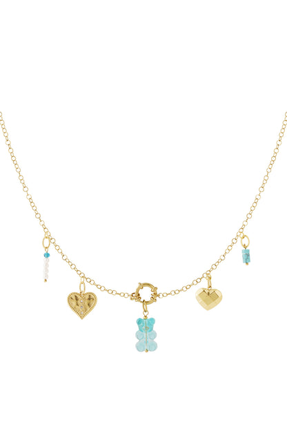 Gold-plated chain necklace laid flat displaying all five charms: blue gummy bear, two heart pendants, and blue and white bead charms, with a round spring clasp in the center