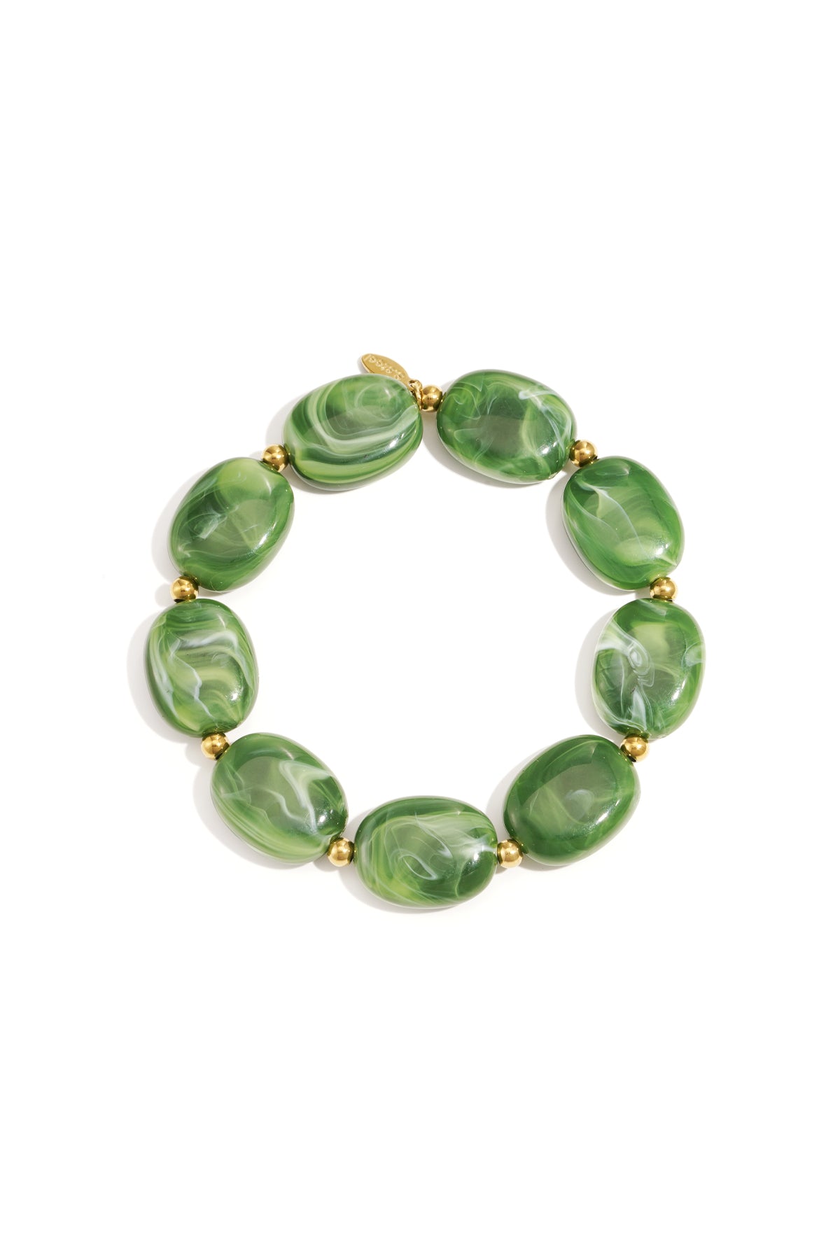 Close-up of a grass green swirled acrylic beaded bracelet with gold spacers on white background