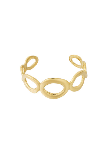 Gold-tone openwork cuff bracelet with linked irregular open oval shapes on white background