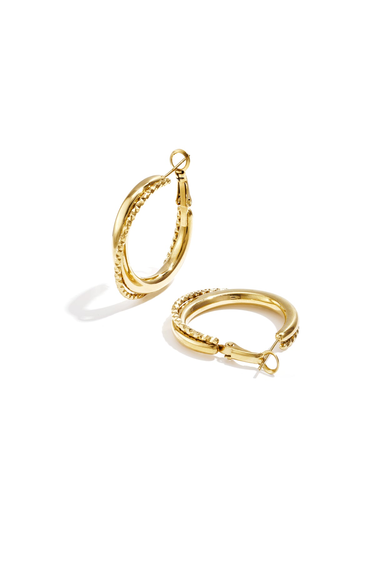 Gold twisted double hoop earrings with smooth and textured finishes, shown on white background.