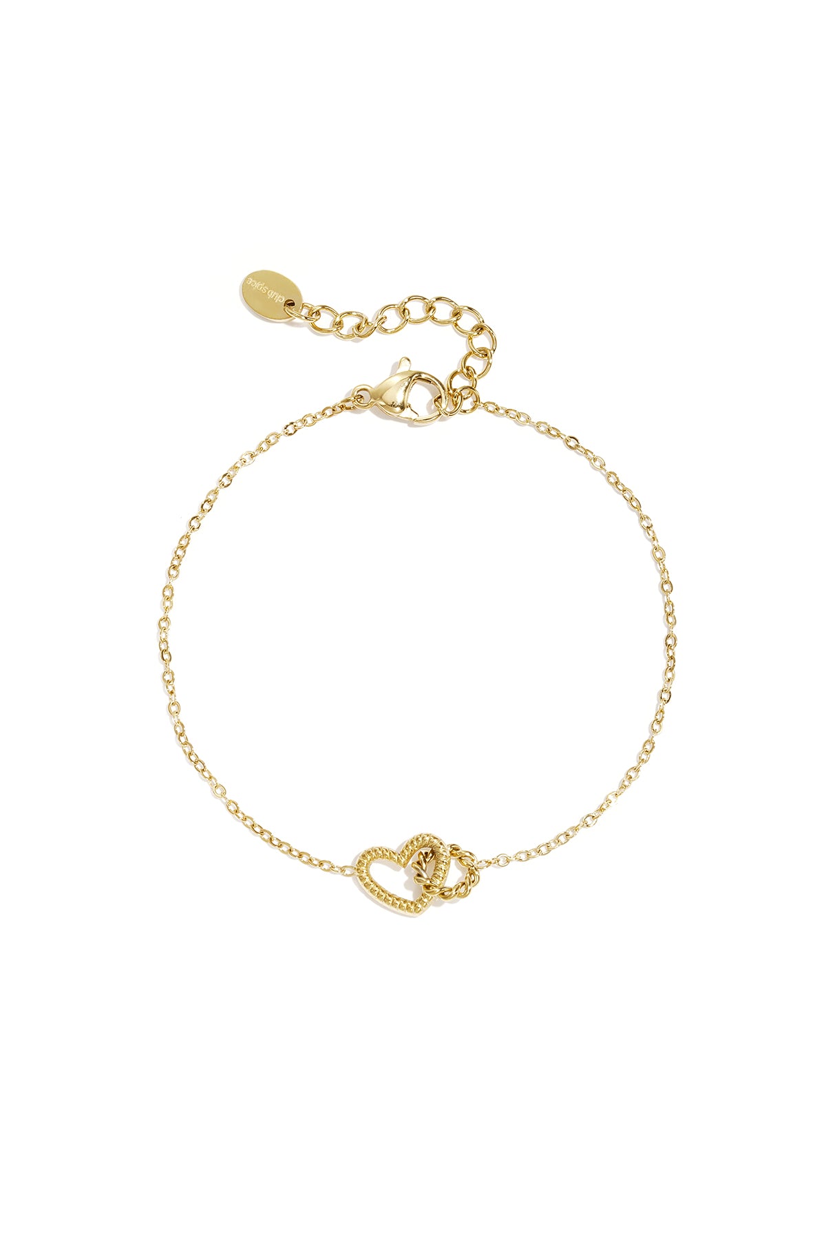 Close-up of delicate gold chain bracelet with textured heart charm and lobster clasp on white background