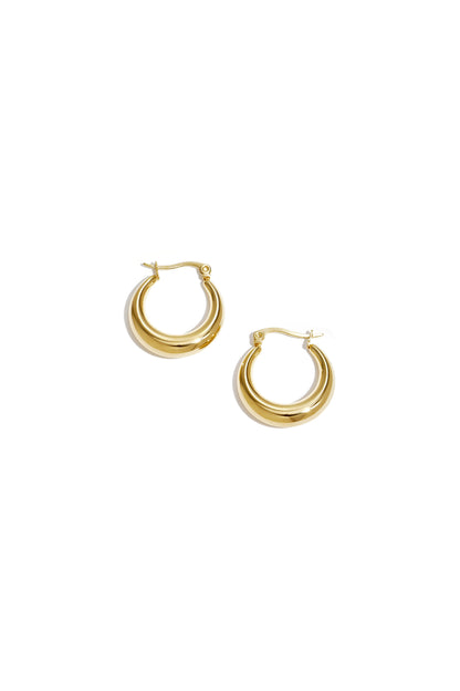 Pair of shiny chunky gold hoop earrings with a smooth polished finish displayed on a white background