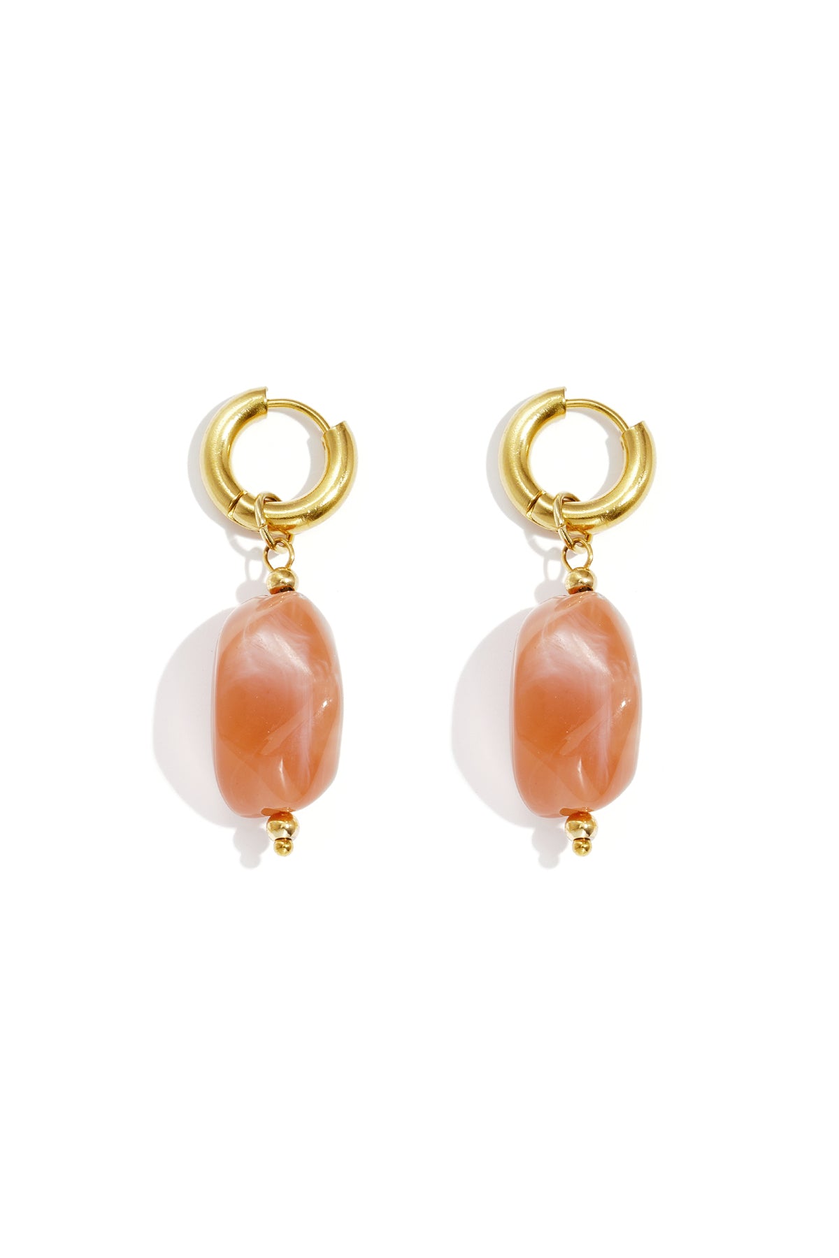 Dreamy Jelly Pebble Drops: Gold hoop earrings featuring translucent, peach-colored organic pebble charms.