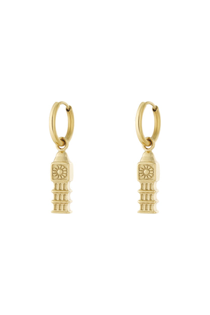Pair of gold drop hoop earrings with detailed iconic tower charms hanging