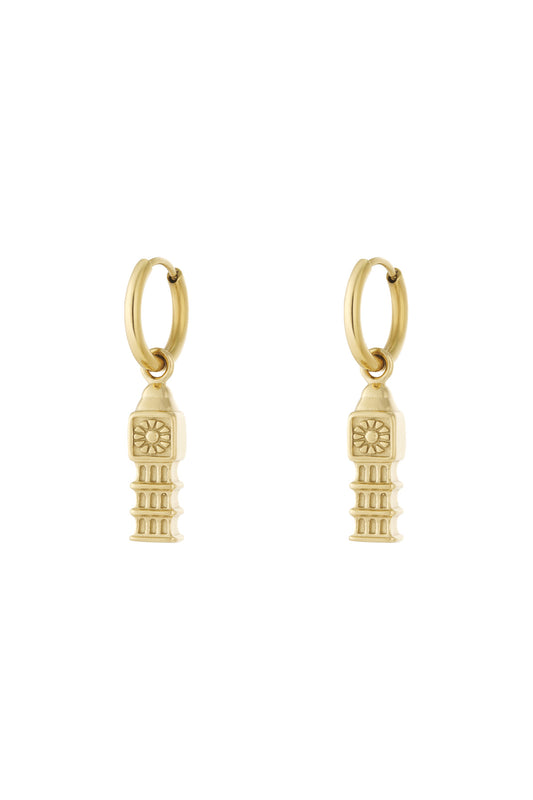 Pair of gold drop hoop earrings with detailed iconic tower charms hanging
