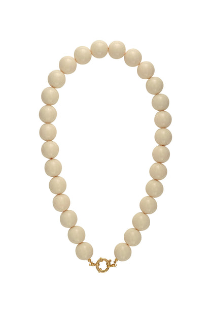 Chunky light blue resin beaded necklace with gold clasp on white background