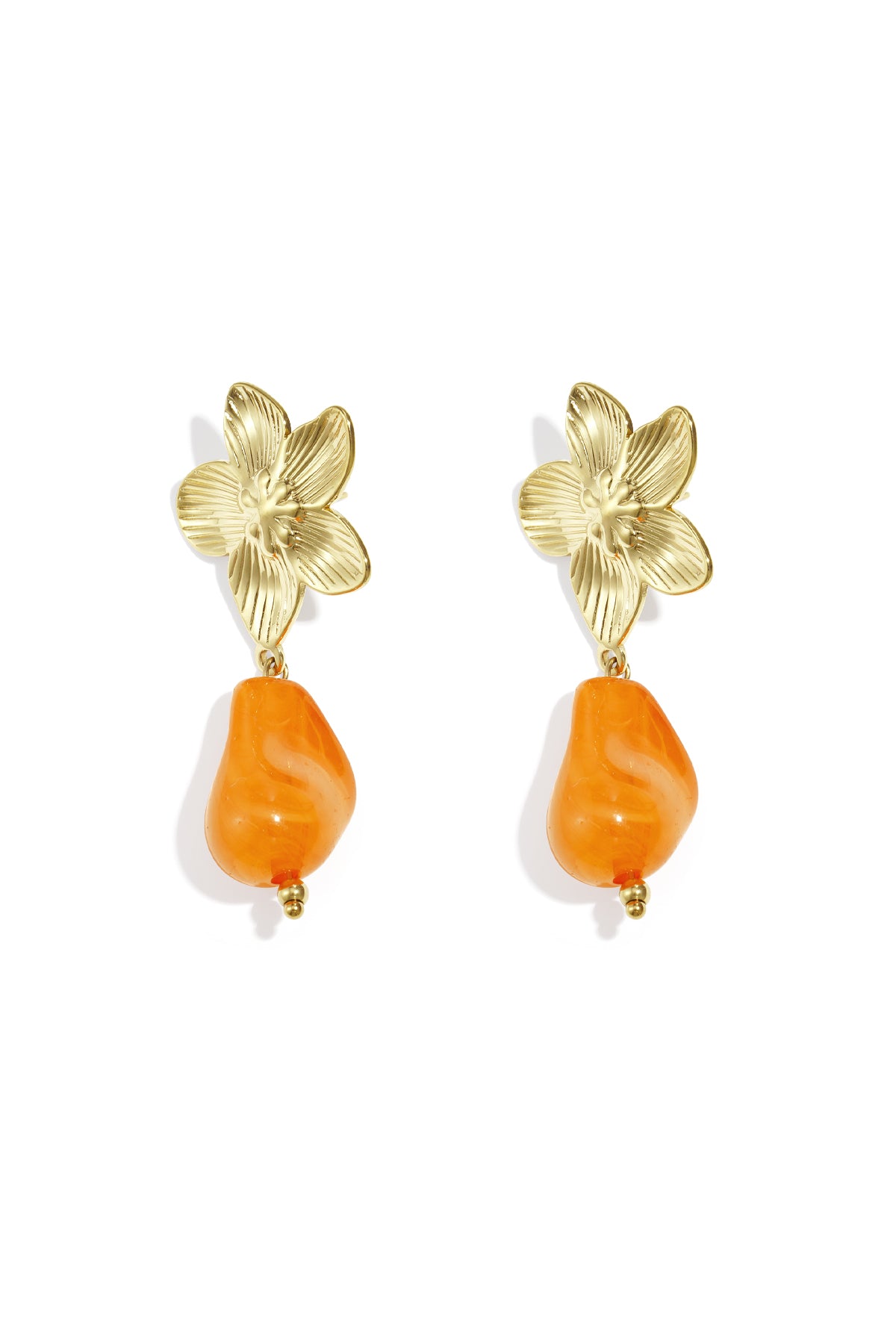 Pair of gold-tone flower drop earrings with vivid pink organic acrylic bead on white background