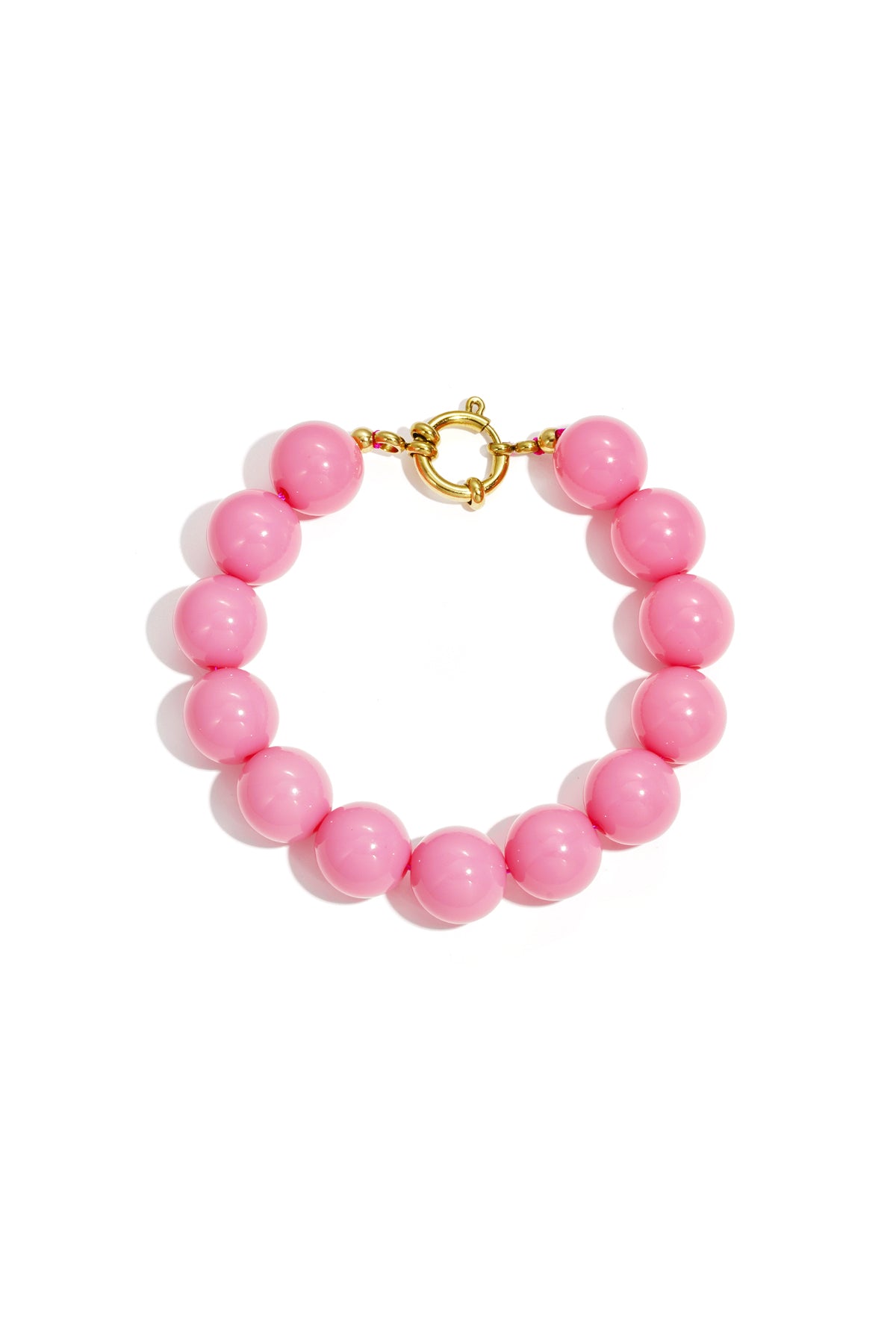 Pink chunky beaded bracelet featuring shiny resin beads and elegant gold clasp