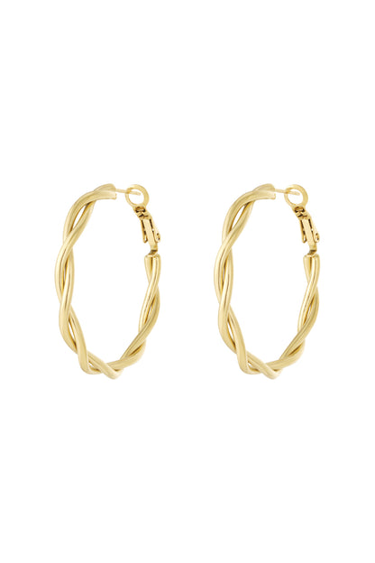 Side view of gold twisted oval hoop earrings with latch back closures on white background