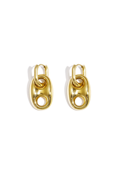 Close-up of shiny gold drop earrings shaped like tab pull rings on a white background