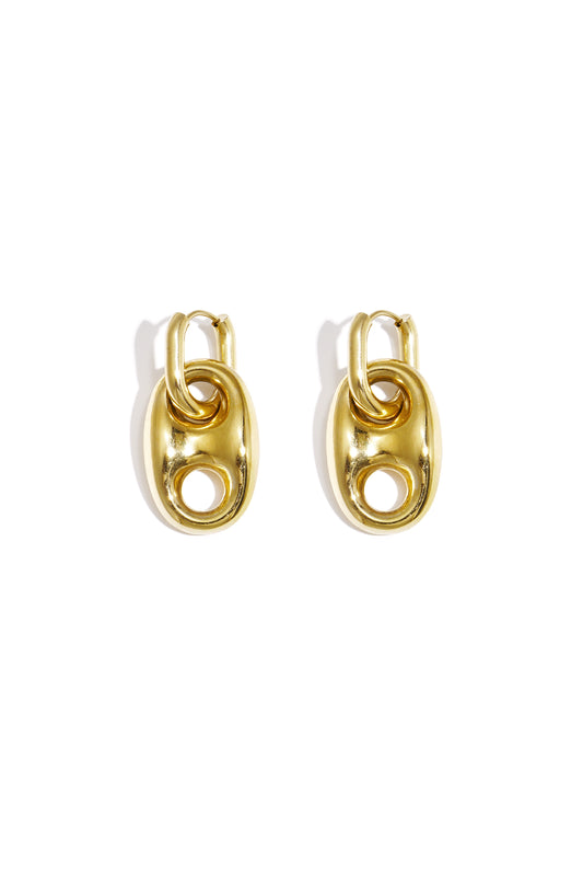 Close-up of shiny gold drop earrings shaped like tab pull rings on a white background