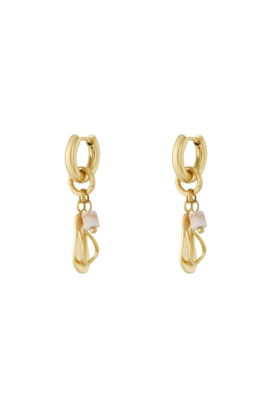 Pair of playful gold drop earrings featuring flip flop charms and pink marble-like bead accents on hoop backs