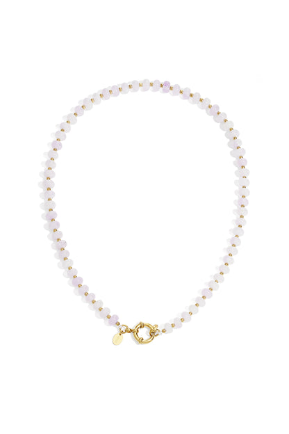 Close-up of a lavender stone beaded necklace with gold beads and toggle clasp