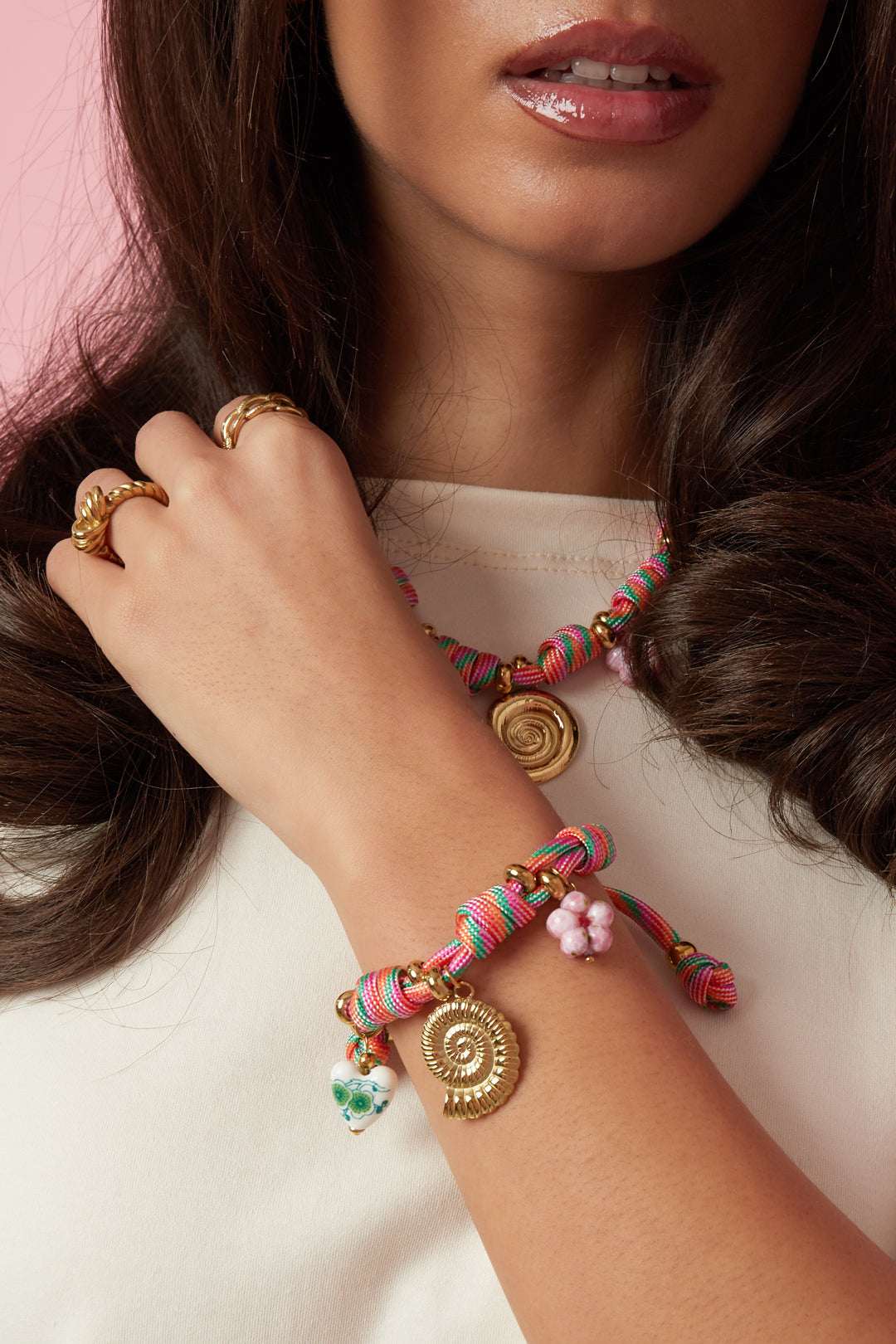 Rope bracelet with knots and shell charms
