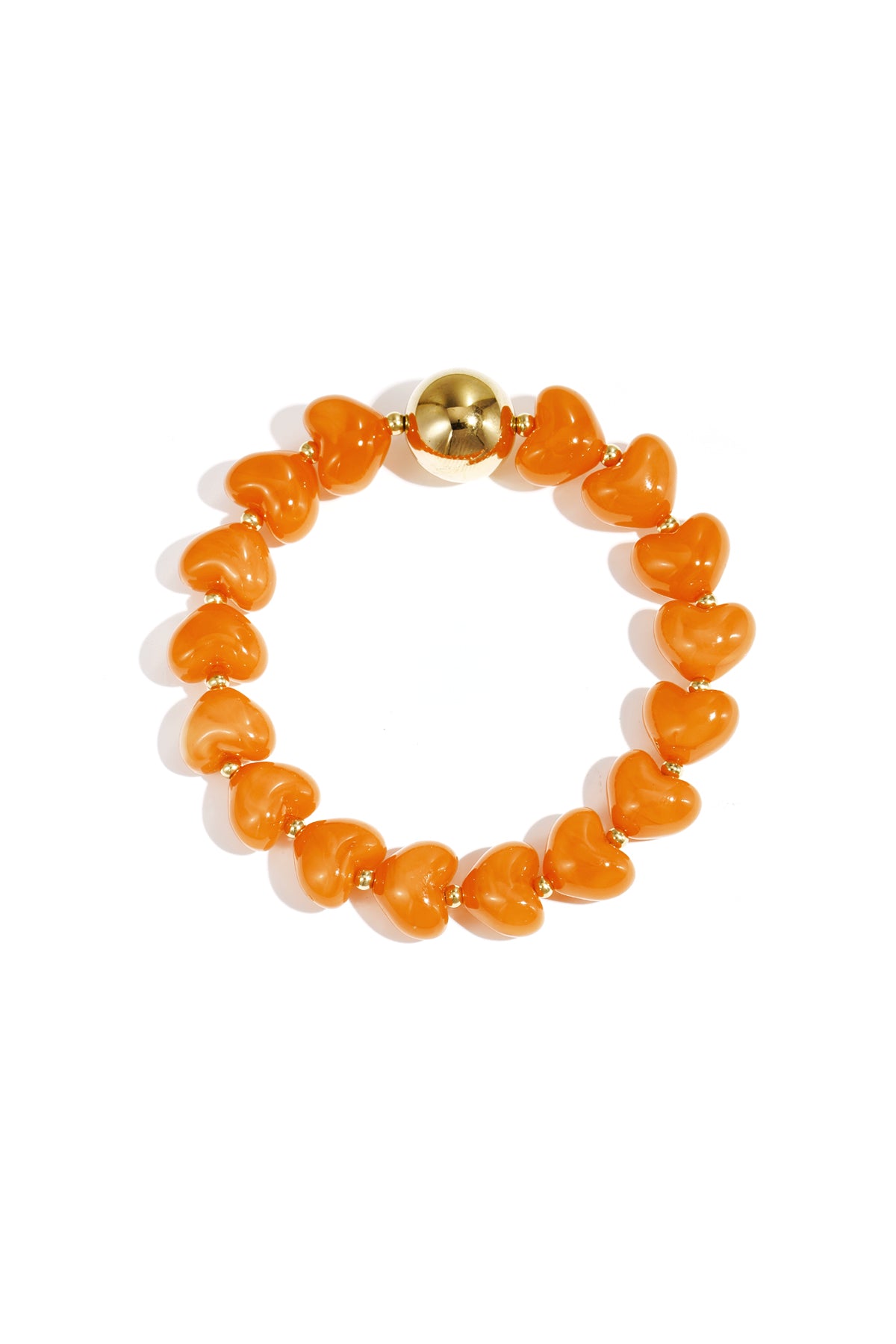 Orange heart-shaped acrylic beaded bracelet with gold bead accent on white background