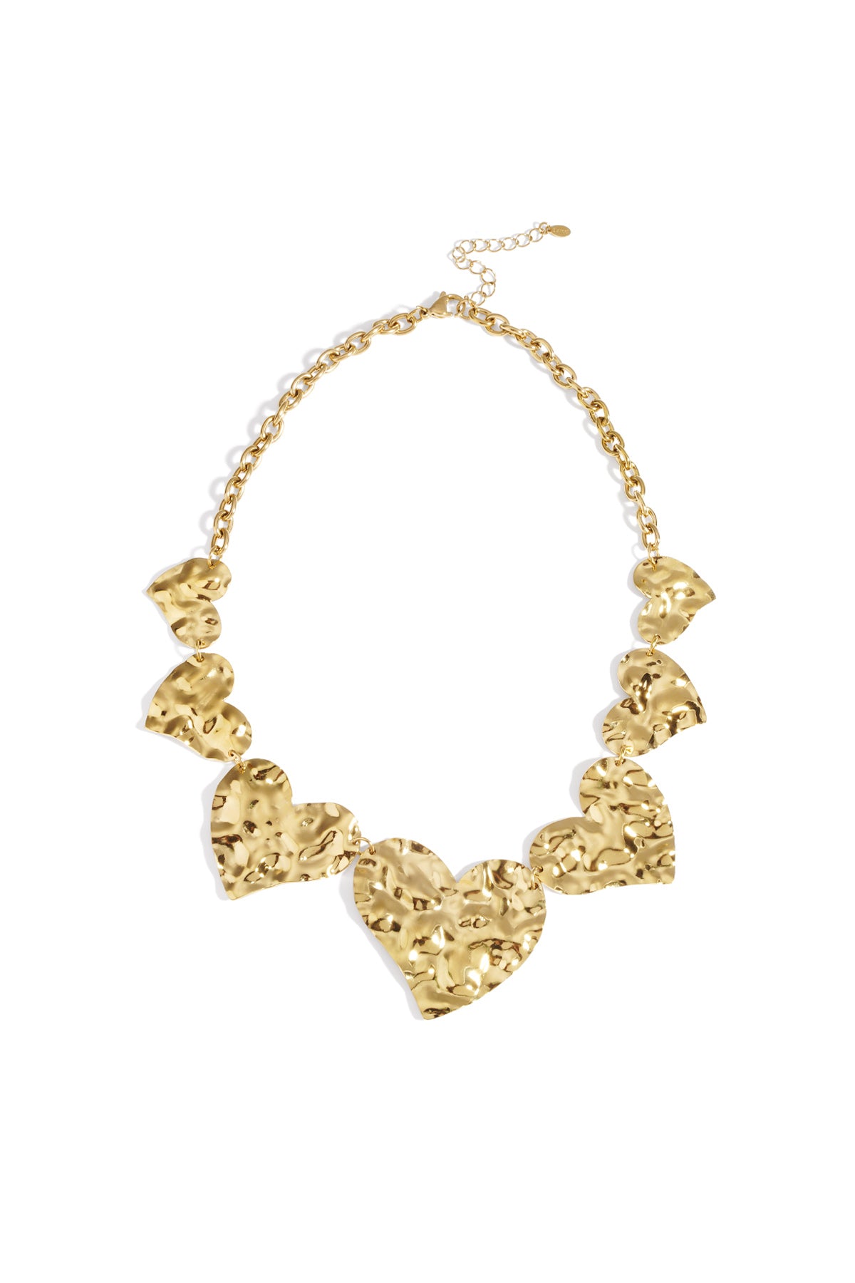 Chunky hammered heart necklace in gold metal with large linked hearts and adjustable chain on white background