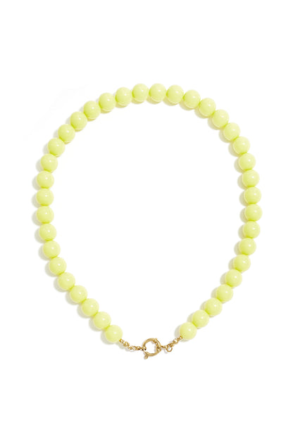 Neon lime green resin beaded necklace in a simple round design with a gold-tone clasp closure.