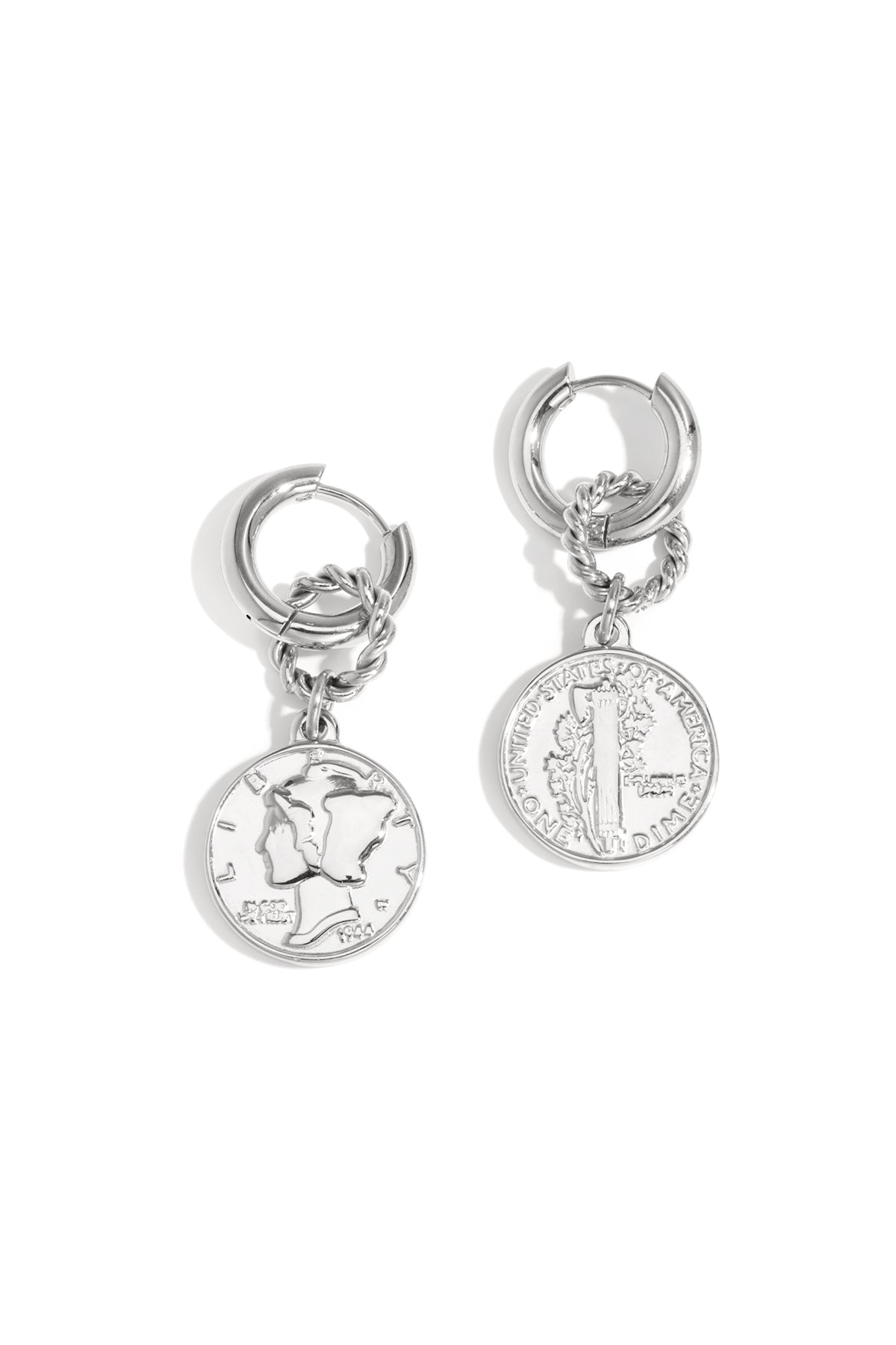 Pair of silver vintage coin hoop earrings with twisted ring detail isolated on white background
