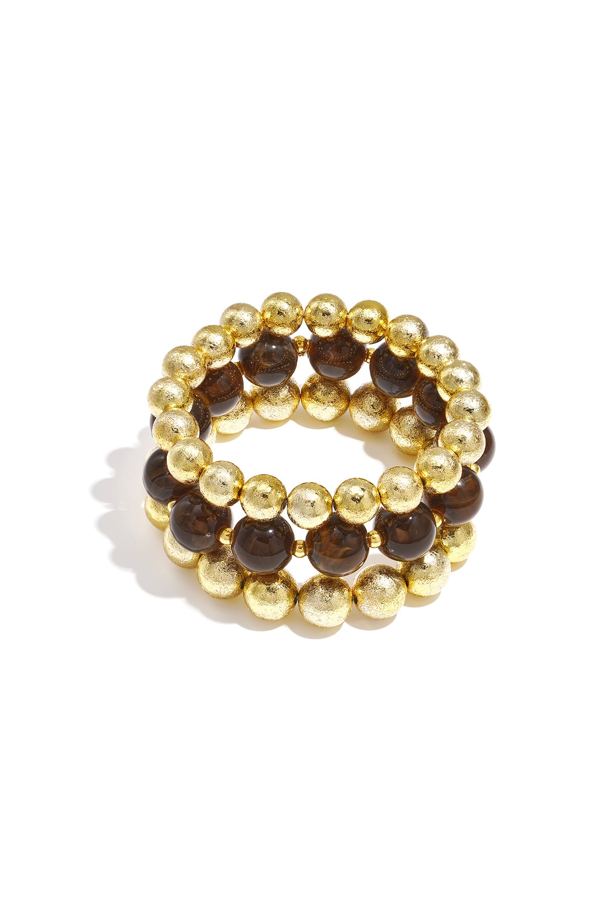 Set of three beaded bracelets with pink marbled beads and textured gold spheres on white background