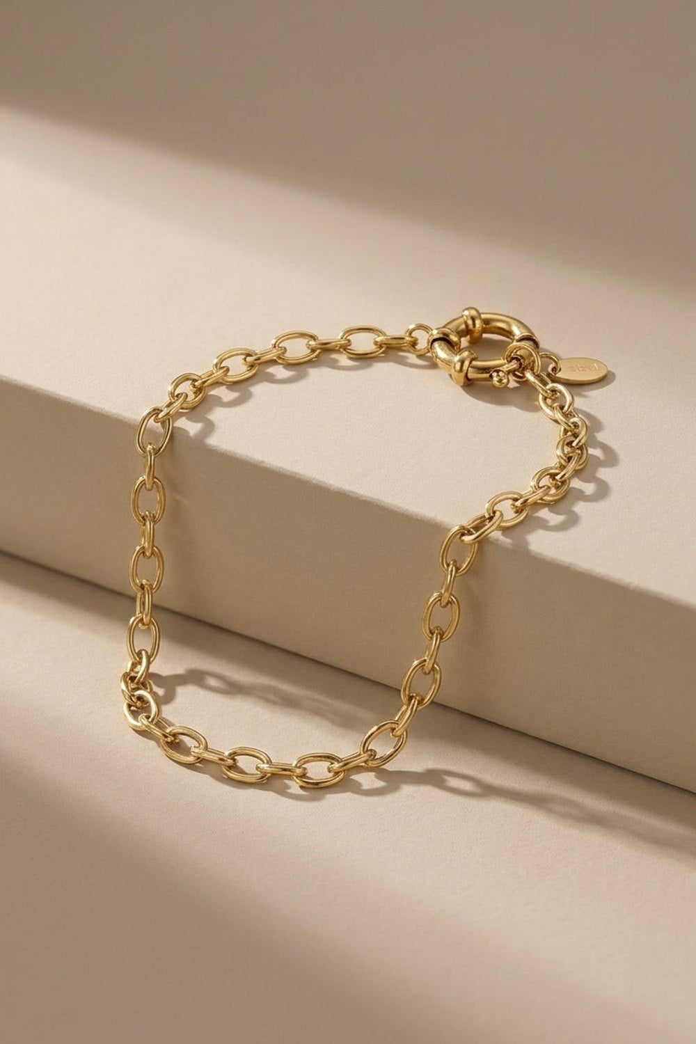 Chained Gold Everyday is a gold chain bracelet featuring interlocking oval links and a secure round clasp.