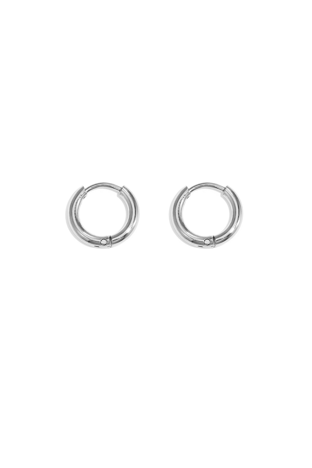 Pair of sleek polished silver minimalist hoop earrings on white background