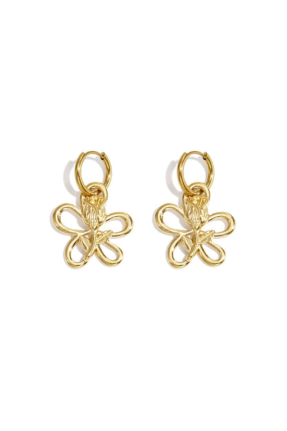 Pair of polished gold-tone drop earrings featuring a minimal flower outline with a rose motif in the center against white background