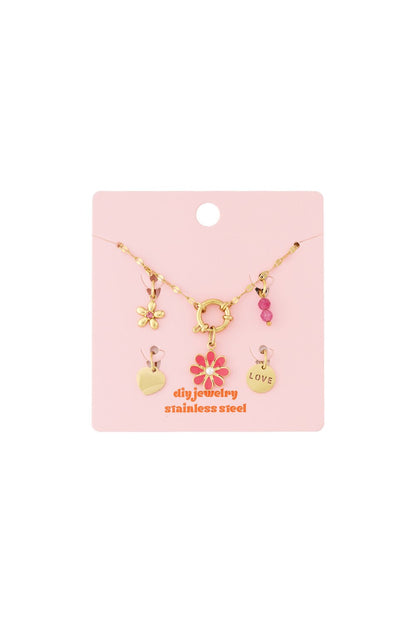 Gold-tone stainless steel DIY jewelry charm set featuring floral, heart, and "LOVE" charms with pink enamel accents.