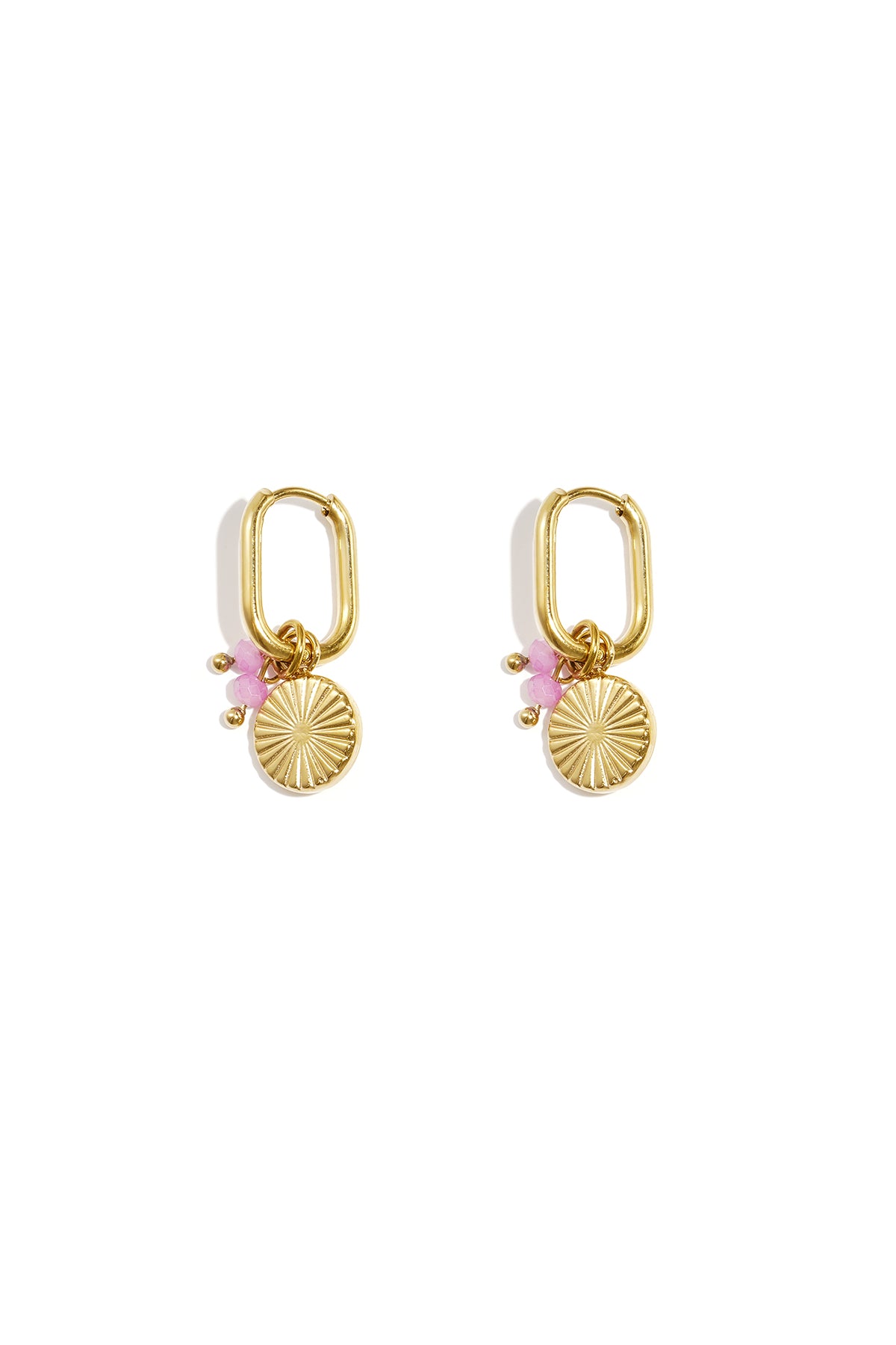 Pair of gold rectangular hoop earrings with sunflower charm and light pink beads on white background