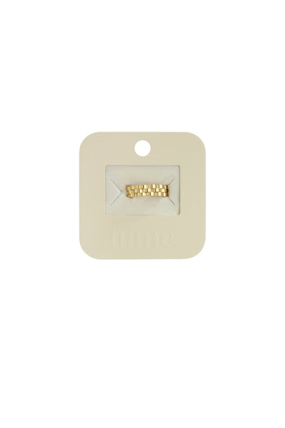 Gold-tone Wavy Drip Ring featuring a textured, link-style band on a branded beige jewelry display card.