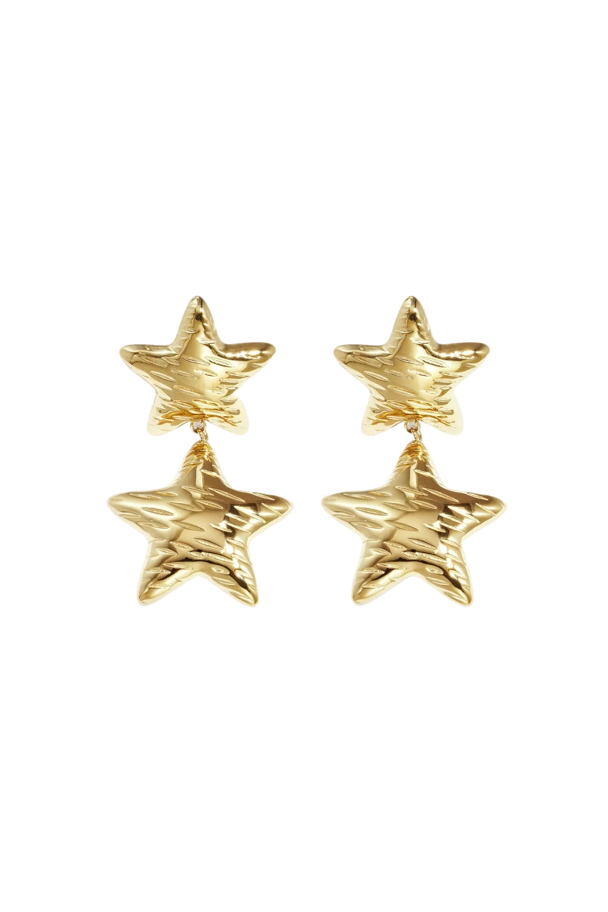 Pair of shiny gold star-shaped double drop earrings with hammered texture on white background