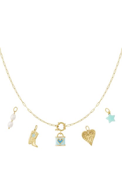 Gold chain necklace with five playful charms including pearl drops, cowboy boot, blue heart pendant, textured heart, and blue star on white background
