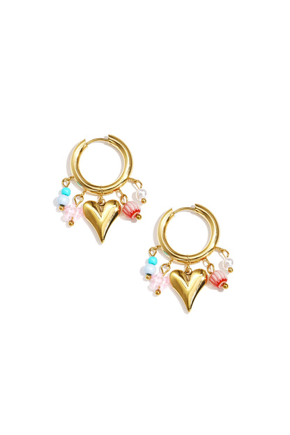 Gold-tone hoop earrings with dangling heart charm and colorful bead accents on white background