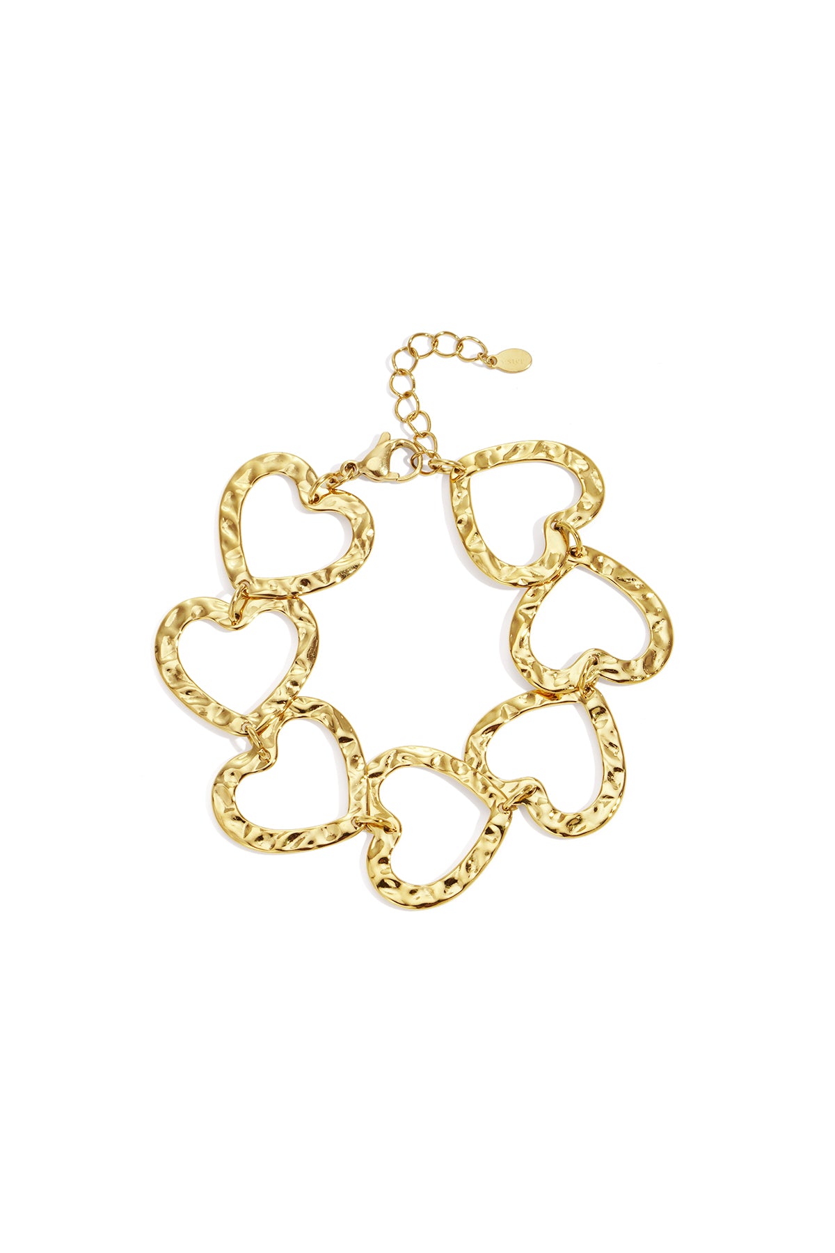 Gold-tone hammered heart link bracelet laid flat with lobster clasp and adjustable chain