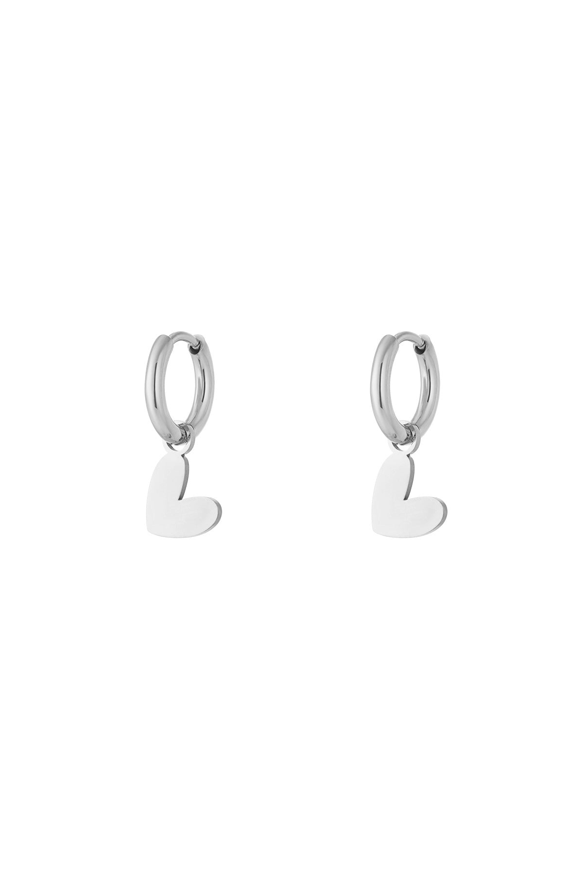 Pair of polished silver heart drop earrings with smooth hoops on plain white background