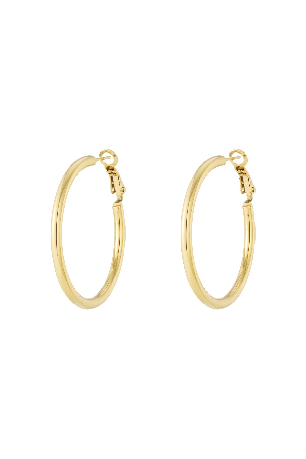 Pair of shiny gold hoop earrings on white background