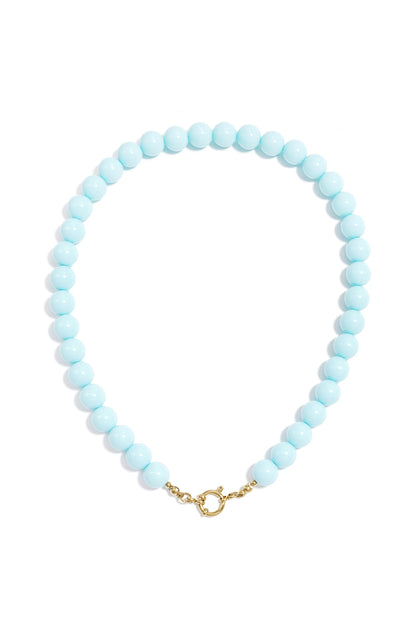Light blue resin beaded necklace with a round gold spring ring clasp on a plain white background.