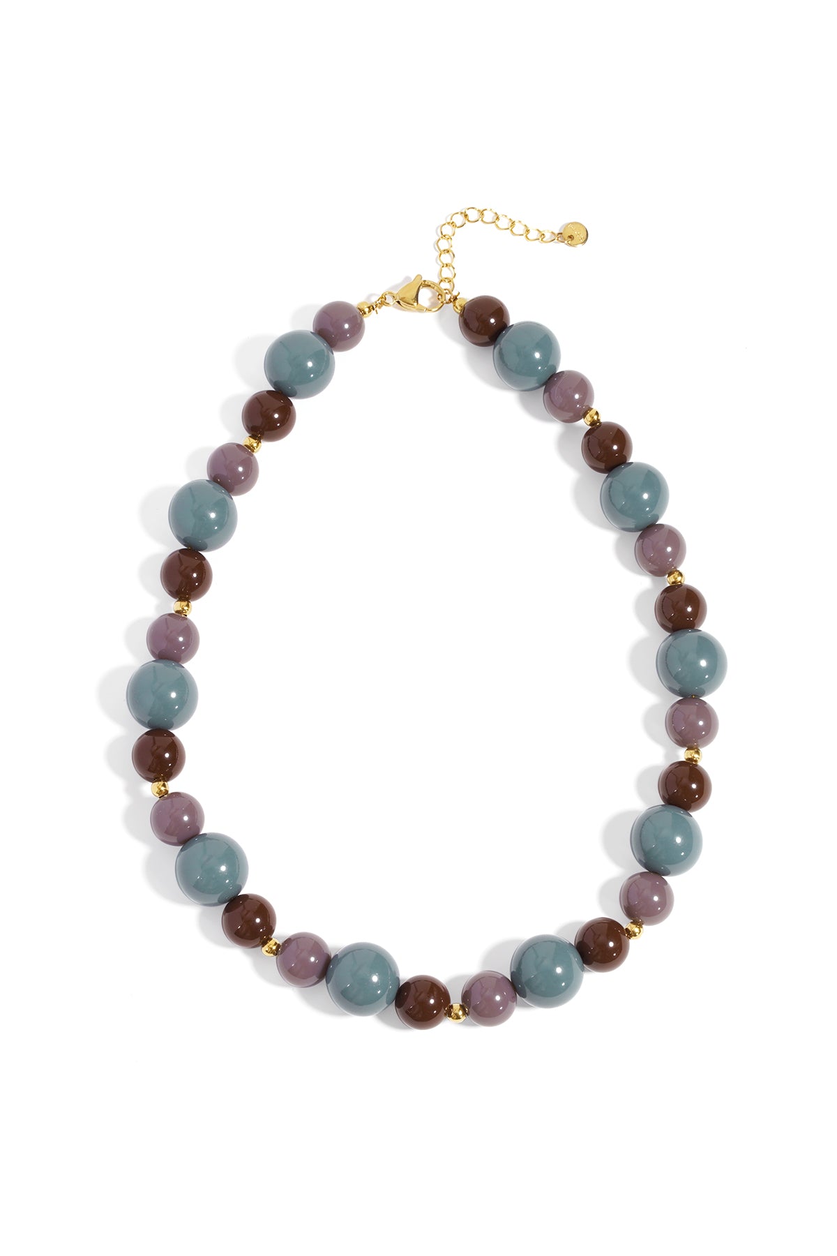 Chunky beaded necklace with burnt orange, chocolate brown, and gold beads on white background