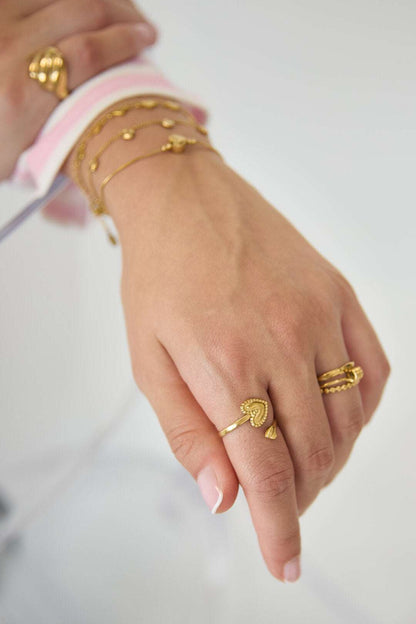 Ring with adjustable hearts
