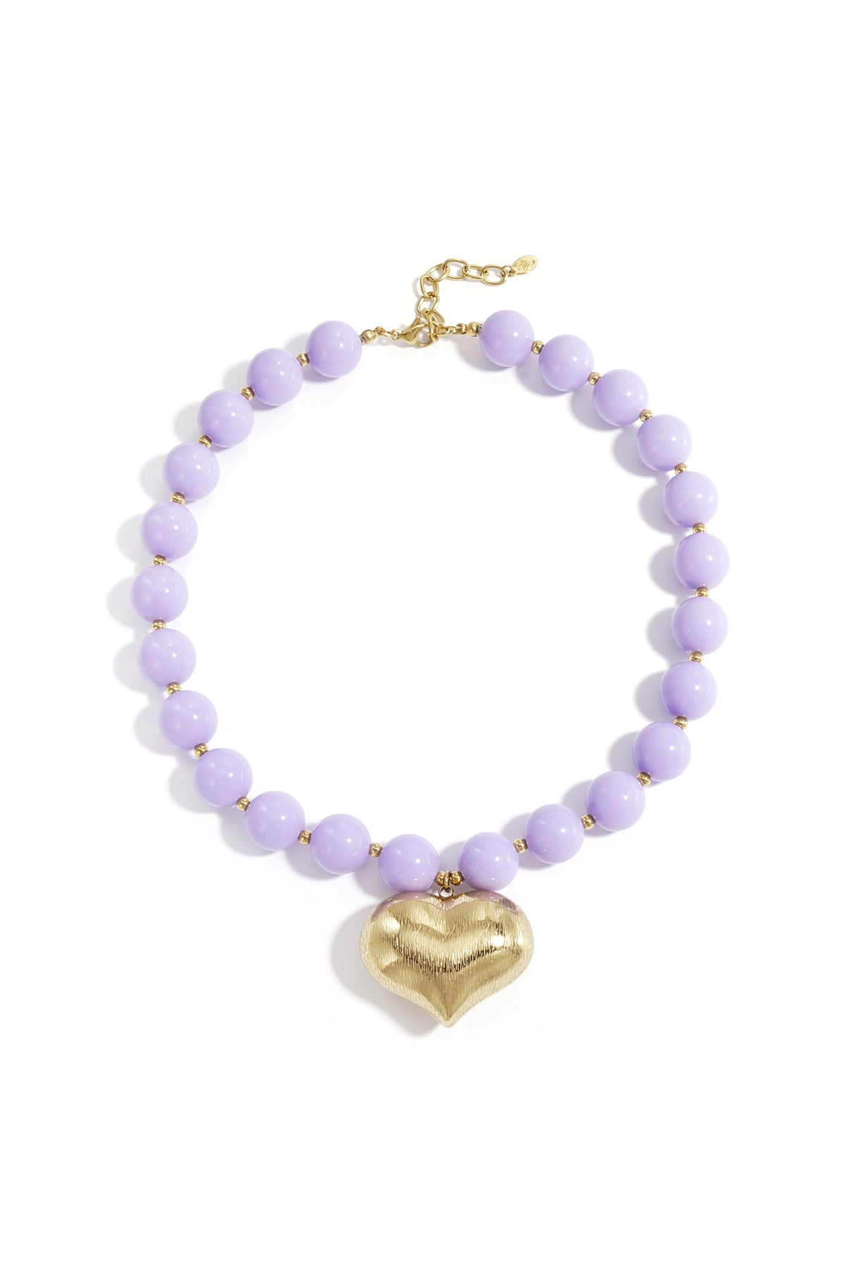 Chunky lavender purple beaded necklace with textured gold heart pendant laid flat