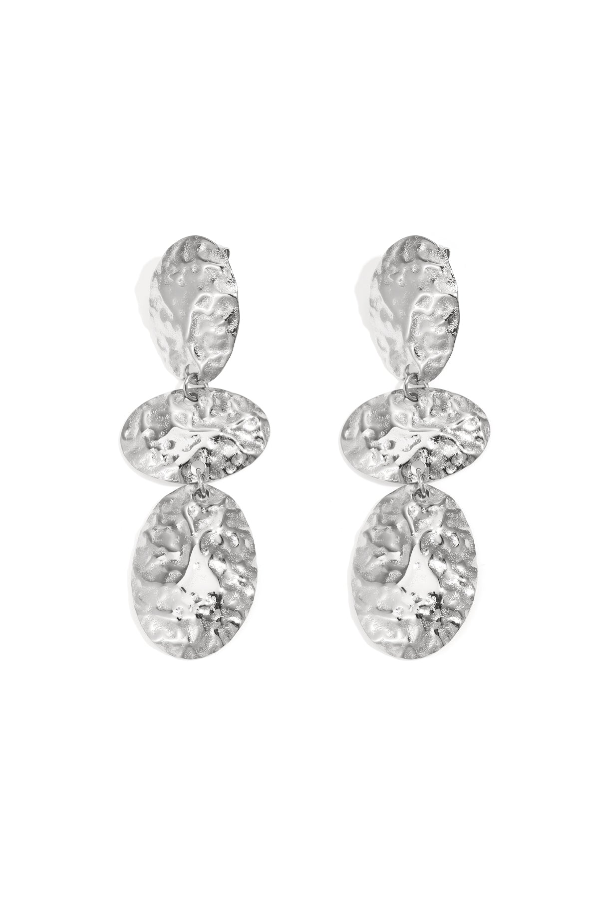 Pair of hammered silver oval dangle earrings with three connected textured oval shapes displayed on white background