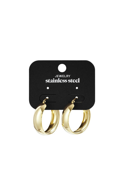 Daily Orbit Hoops: Thick, polished gold-tone stainless steel hoop earrings on a display card.