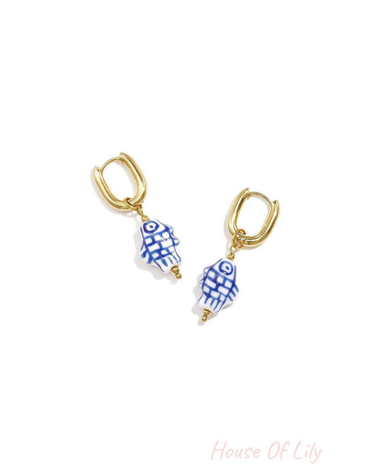 Squoval earrings with checkered fish charm