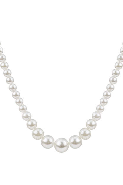 Close-up of a pearl beaded necklace with graduated white imitation pearls arranged from smaller to larger in the center