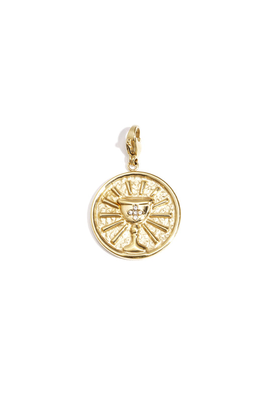 Gold circular pendant charm with a raised chalice design and rhinestone accents on a lobster clasp