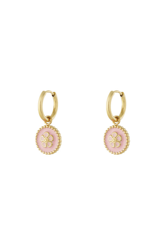 Gold-tone hoop drop earrings with pink enamel flower charm and beaded edge on white background