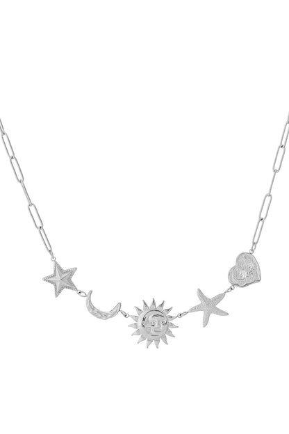 Silver pendant necklace featuring star, crescent moon, sun, starfish, and heart charms on elongated chain